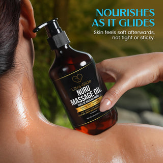 Nuru Massage Oil bottle held against an oiled shoulder, skin soft and not sticky